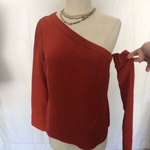 Lavish 💯 silk one shoulder with separate arm blouse rust color size S